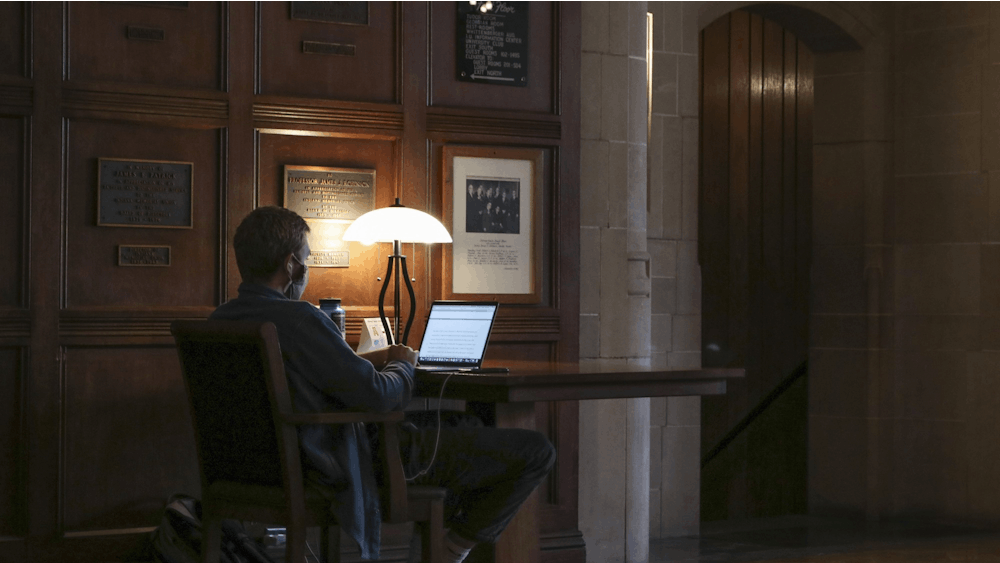 A student studies Dec. 6, 2021, in the south lounge of the Indiana Memorial Union.