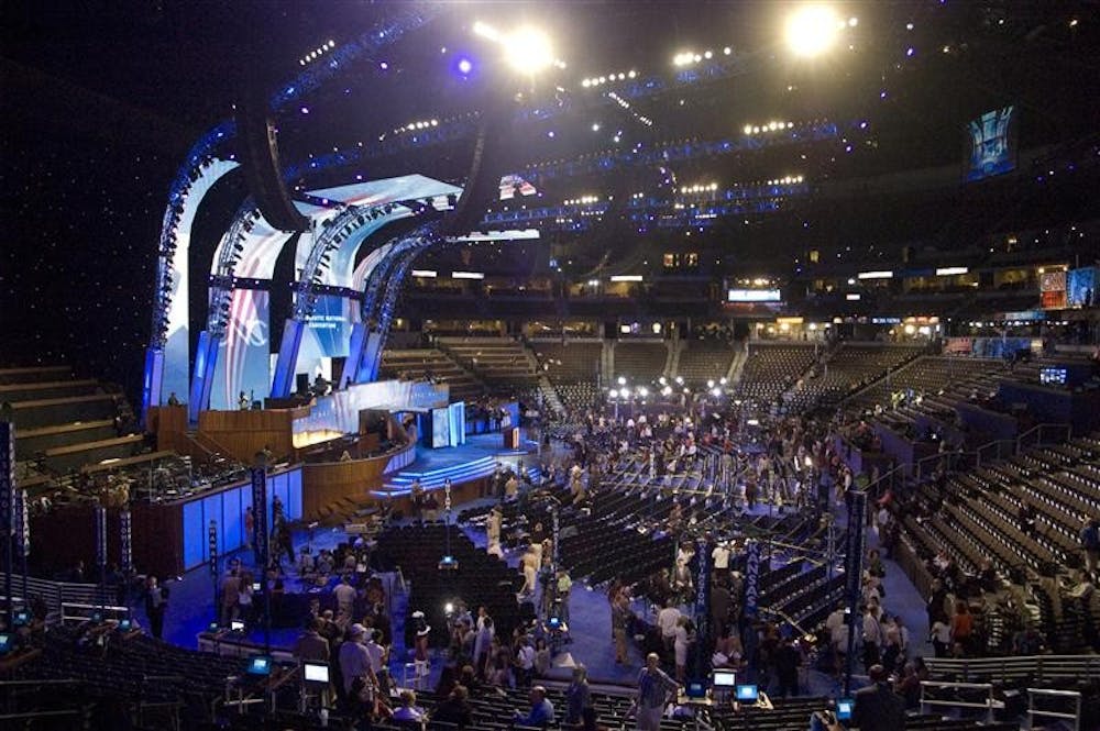 Delegates slowly trickle into the Pepsi Center for the kickoff of the Democratic National Convention on Monday in Denver.
