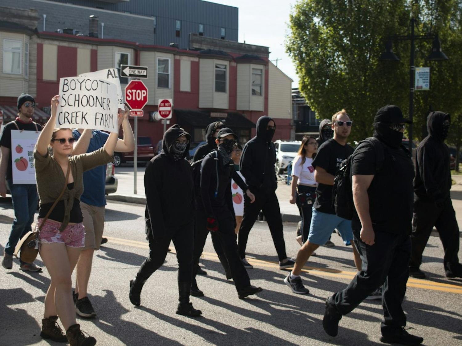 GALLERY: Antifa and No Space for Hate protest Bloomington Community Farmers' Market 