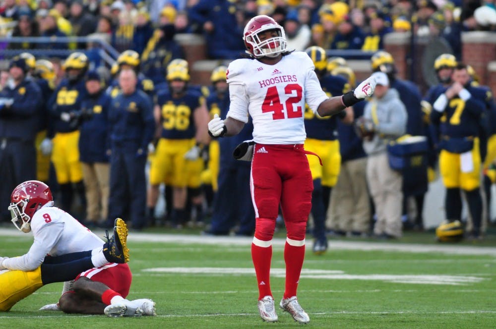 Freshman defender Marcelino Ball celebrates a stop in the first half. At halftime, IU leads No. 3 Michigan 7-3.