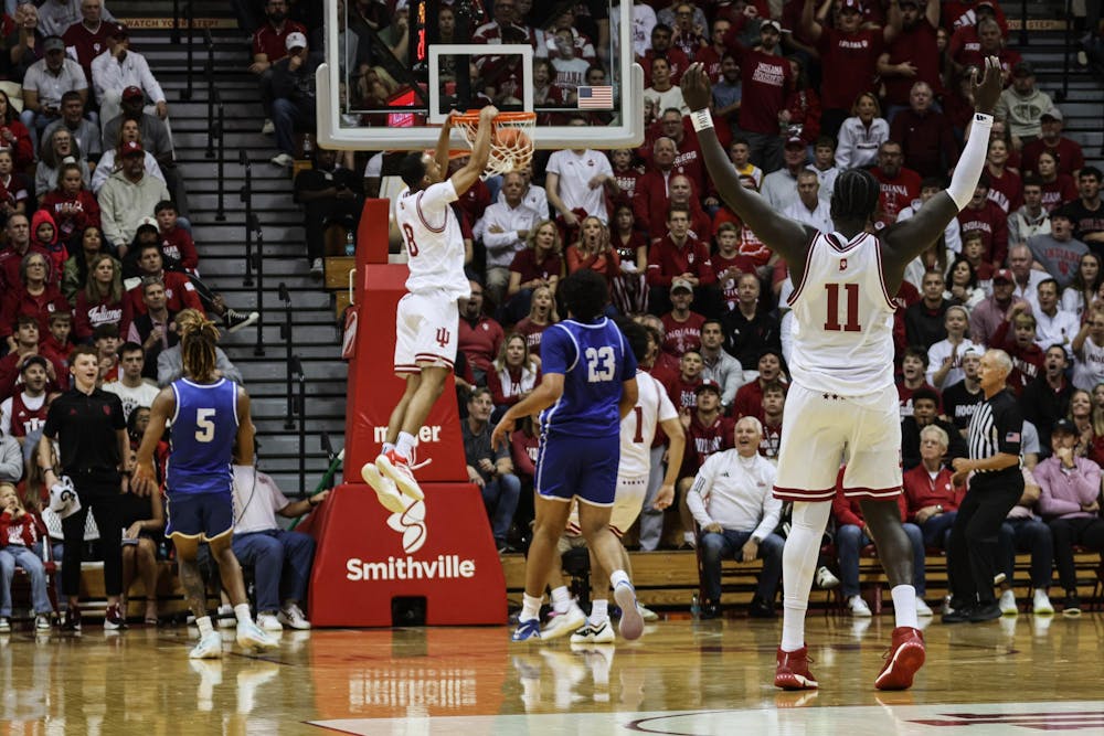 Fifth year Senior Oumar Ballo celebrates his teammates dunk during their game against EIU Nov. 10, 2024, at Assembly Hall in Bloomington. The Hoosiers beat EIU sunday afternoon 90-55.