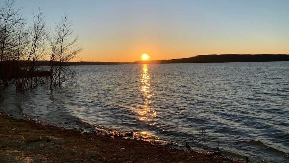 The sun rises March 30, 2021 on Monroe Lake. ﻿The bodies of missing IU students Siddhant Shah, 19, and Aryan Vaidya, 20, were recovered from Monroe Lake on ﻿Tuesday.