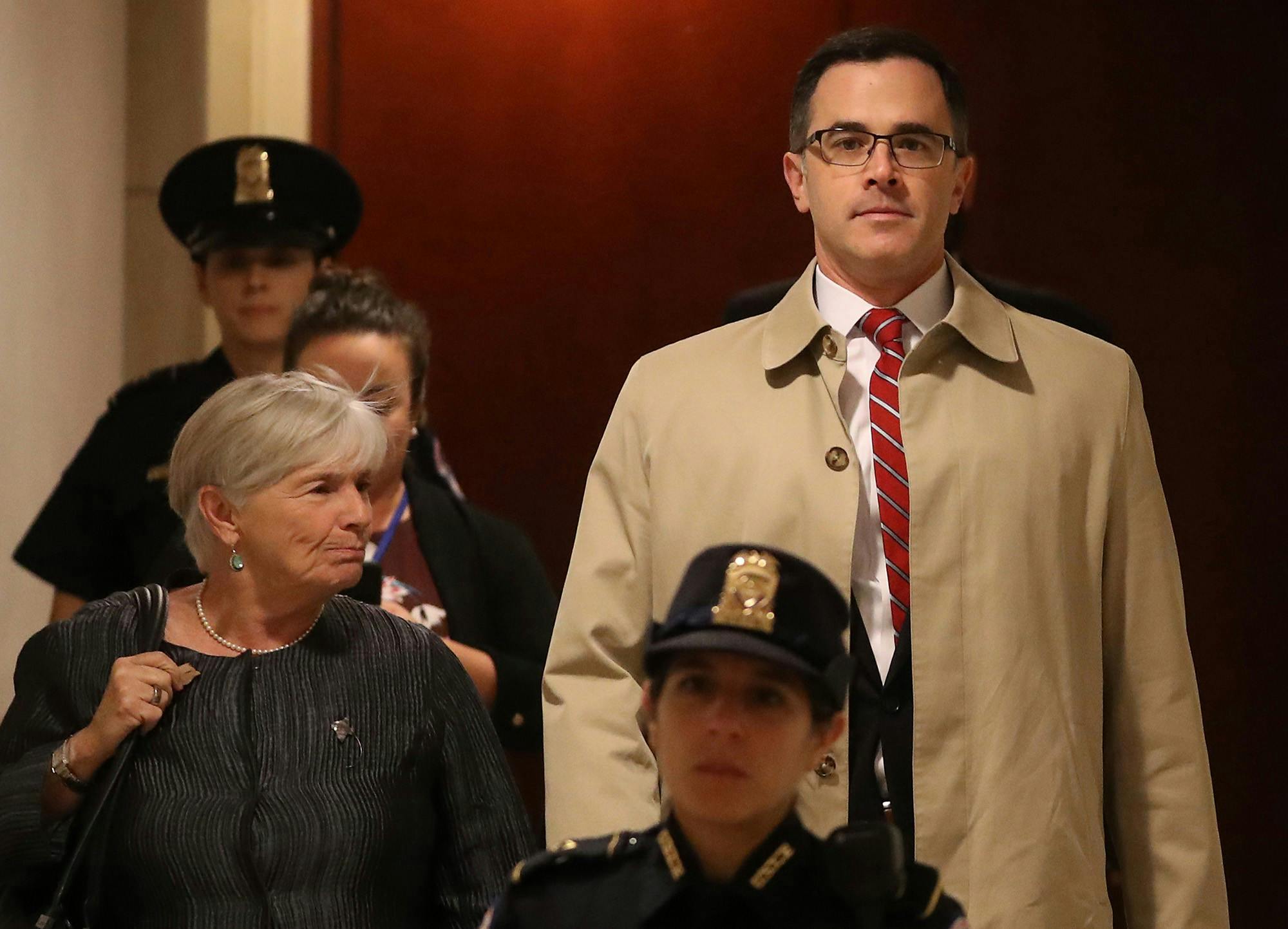 National Security Council's Russia and Europe director Timothy Morrison is escorted Oct. 31 to a closed-door deposition in Washington, D.C.