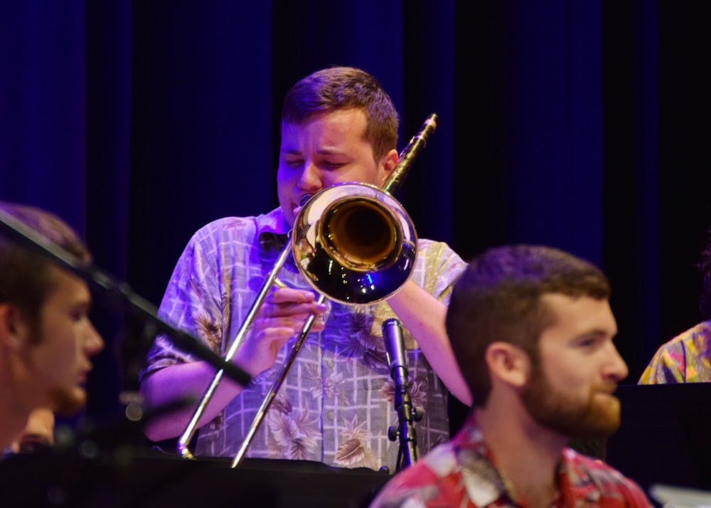 Trombonist Matthew Waterman plays a solo during "Paso a paso" by Wayne Wallace. The Latin Jazz Ensemble performed at the Buskirk-Chumley Theater Oct. 9 along with Soneros la Caliza.