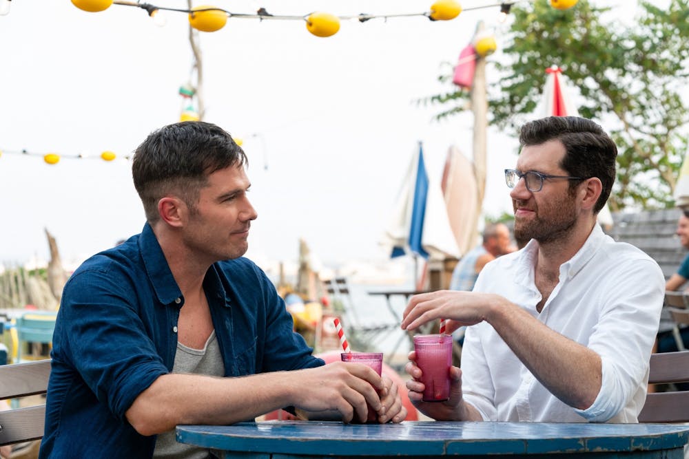 <p>Luke Macfarlane and Billy Eichner are seen talking during a scene in &quot;Bros.&quot; The film is co-written, produced and directed by Nicholas Stoller.</p>