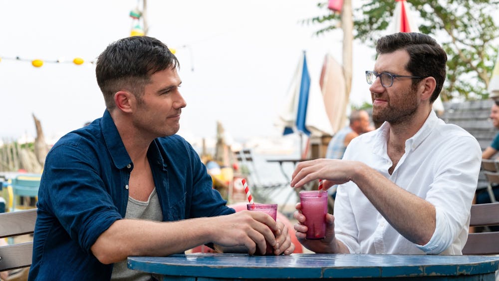 Luke Macfarlane and Billy Eichner are seen talking during a scene in &quot;Bros.&quot; The film is co-written, produced and directed by Nicholas Stoller.