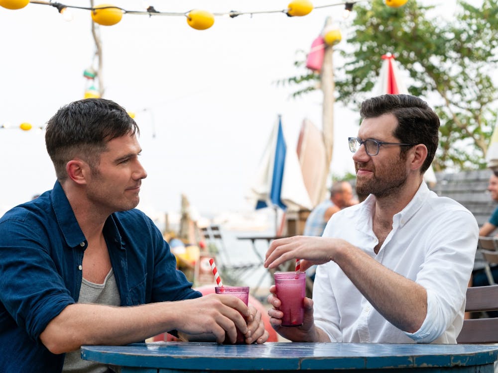 Luke Macfarlane and Billy Eichner are seen talking during a scene in &quot;Bros.&quot; The film is co-written, produced and directed by Nicholas Stoller.