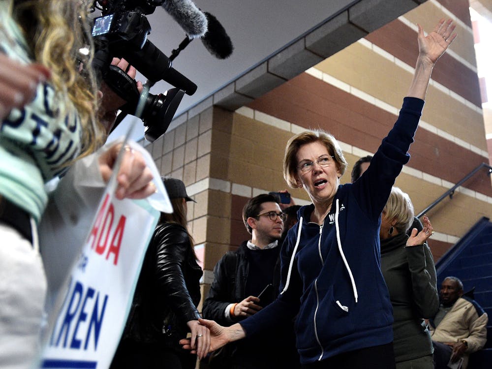 Democratic presidential candidate Sen. Elizabeth Warren, D-Mass., waves to caucus goers Feb. 22 at Coronado High School.