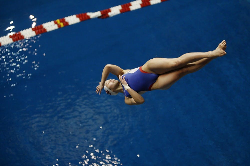 <p>Jessica Parratto practices a back one and a half with one and a half twists off the five-meter platform in 2015 at the Counsilman Billingsley Aquatic Center. </p><p></p>