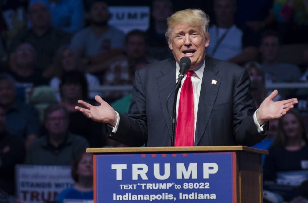 Donald Trump speaks during his rally at the Indiana Farmers Coliseum in Indianapolis on Wednesday. His speech railed against current US trade policy. "You can't be a free trader if you have stupid people negotiating for them," he said.&nbsp;