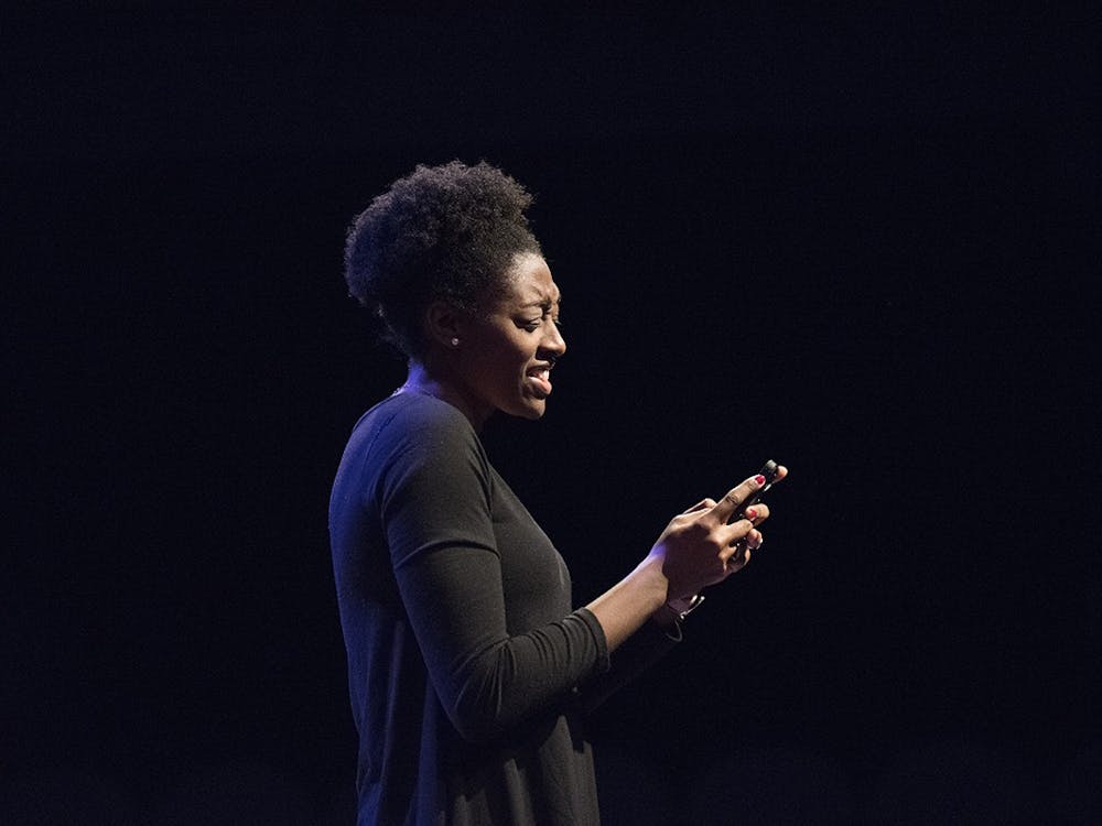 Former student Keilah Johnson performs the &quot;To Do List After Break-Up&quot; from the Rupi Kaur&#x27;s poetry book &quot;Milk and Honey&quot; March 2, 2017, at the Lee Norvelle Theatre and Drama Center. 