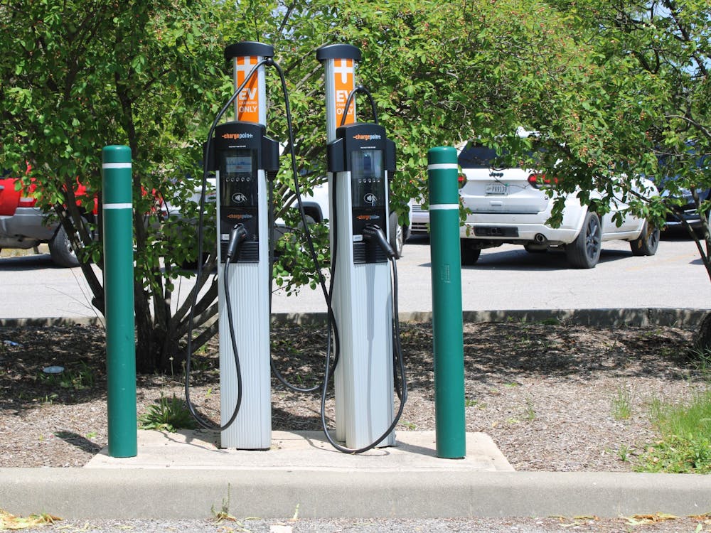 An electric charging station is seen May 29, 2022, at College Mall. Organizations have expressed concerns that communities made up of predominantly people of color are not included in the Indiana Department of Transportation&#x27;s mapping of electric vehicle charging stations.