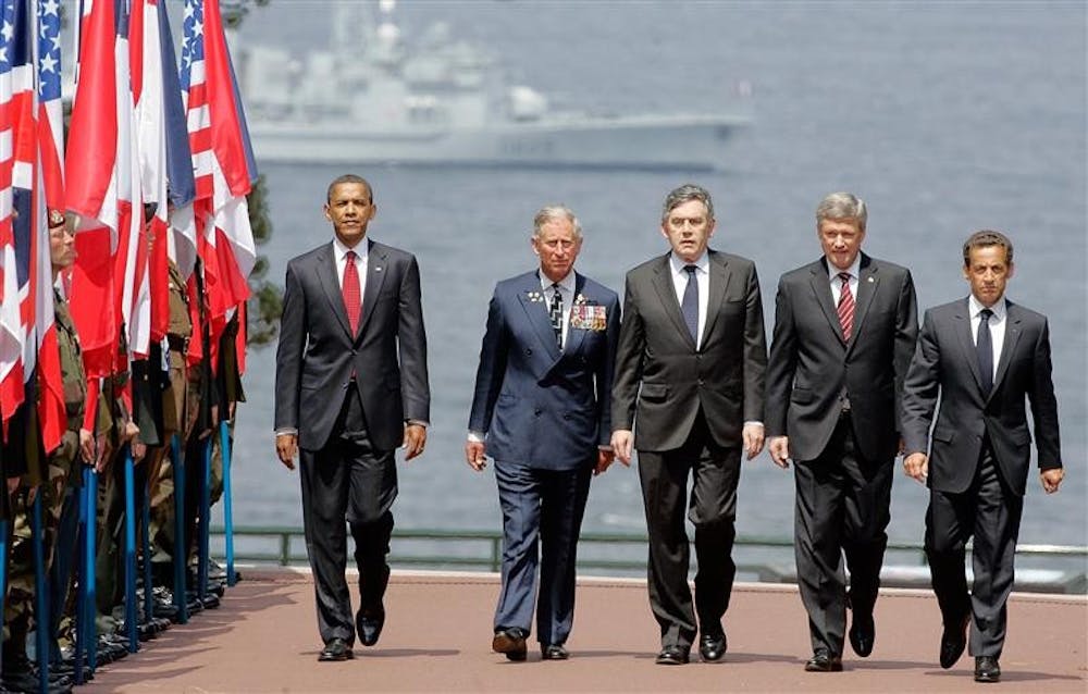 From left, U.S. President Barack Obama, Britain's Prince Charles, British Prime Minister Gordon Brown, Canadian Prime Minister Stephen Harper, and French President Nicolas Sarkozy arrive at the American Cemetery at Colleville-Sur -Mer, near Caen, Western France, Saturday, June 6, 2009 to attend the 65th Anniversary of the D-day landings in Normandy.