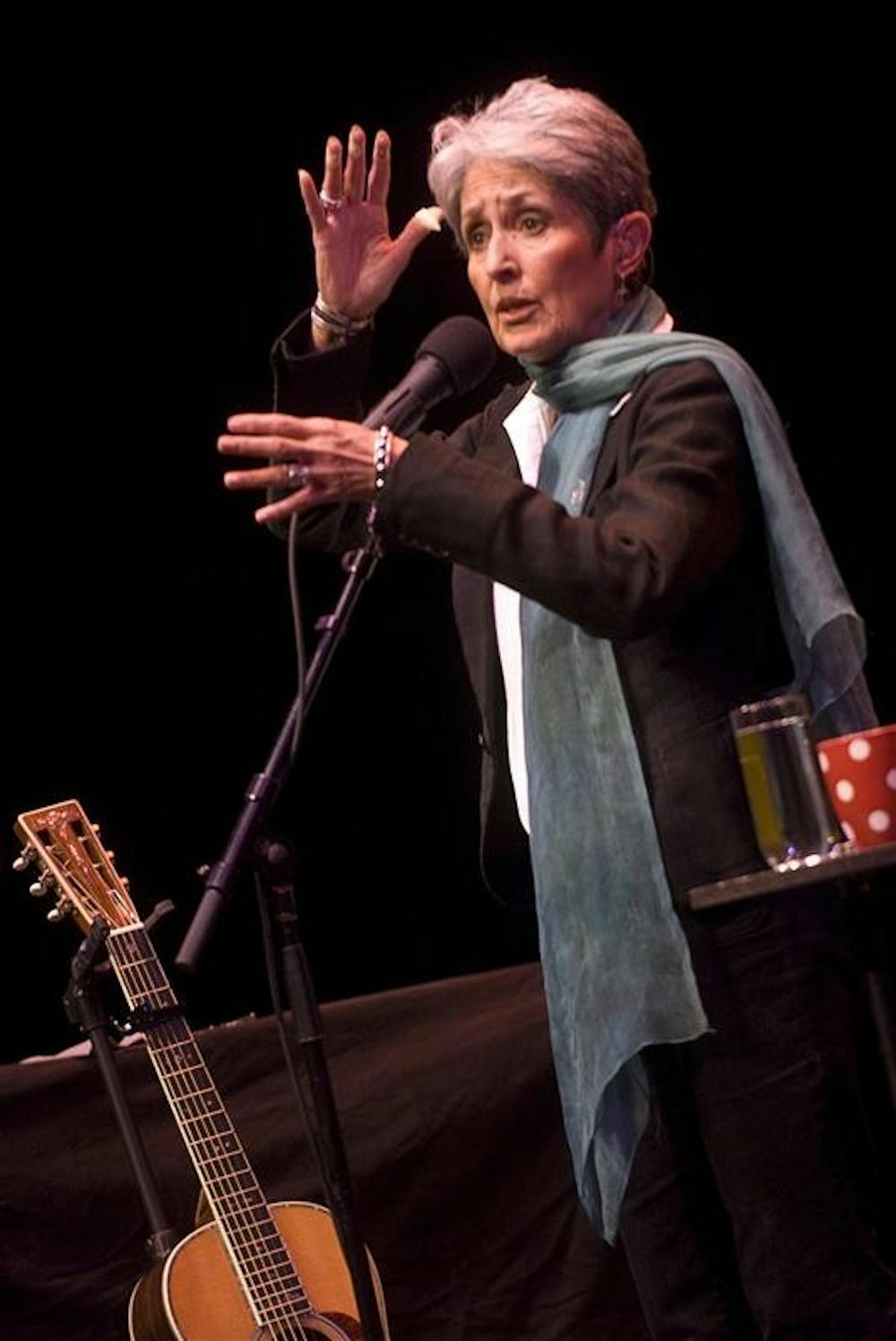 American folk musician Joan Baez talks to the audience during her performance March 13 at the Buskirk-Chumley Theater. The singer-songwriter who champions social activism and human rights through her music played tunes spanning her 50-year career.