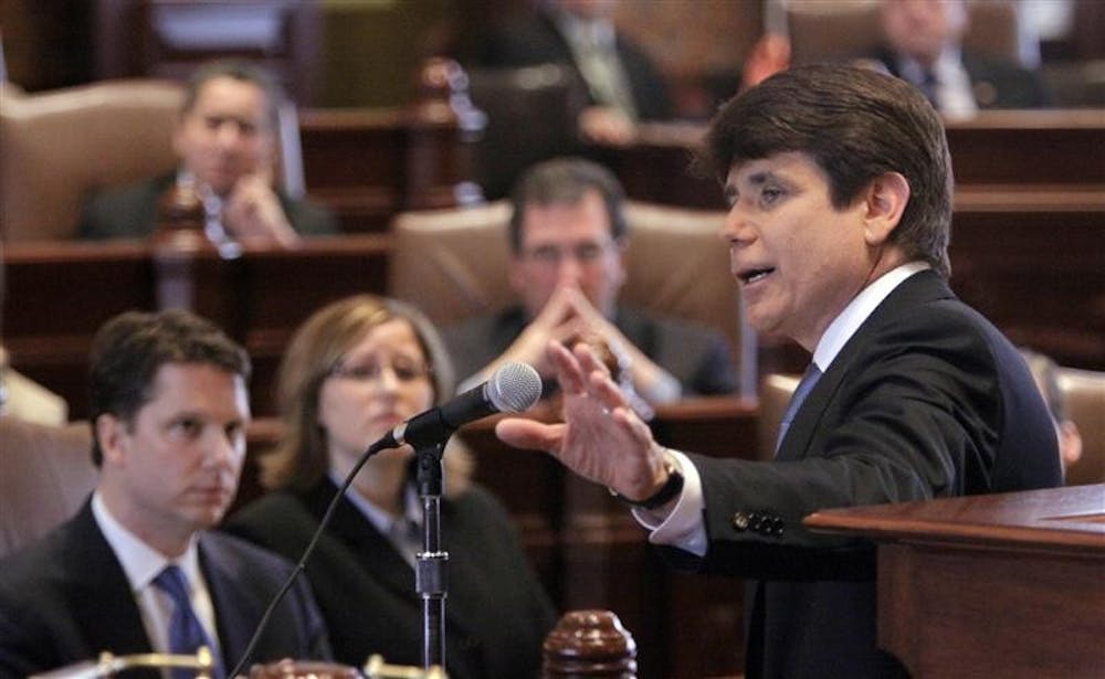 Illinois Gov. Rod Blagojevich delivers his closing argument at his impeachment trial as House prosecutor David Ellis, left, listens Thursday in Springfield, Ill.