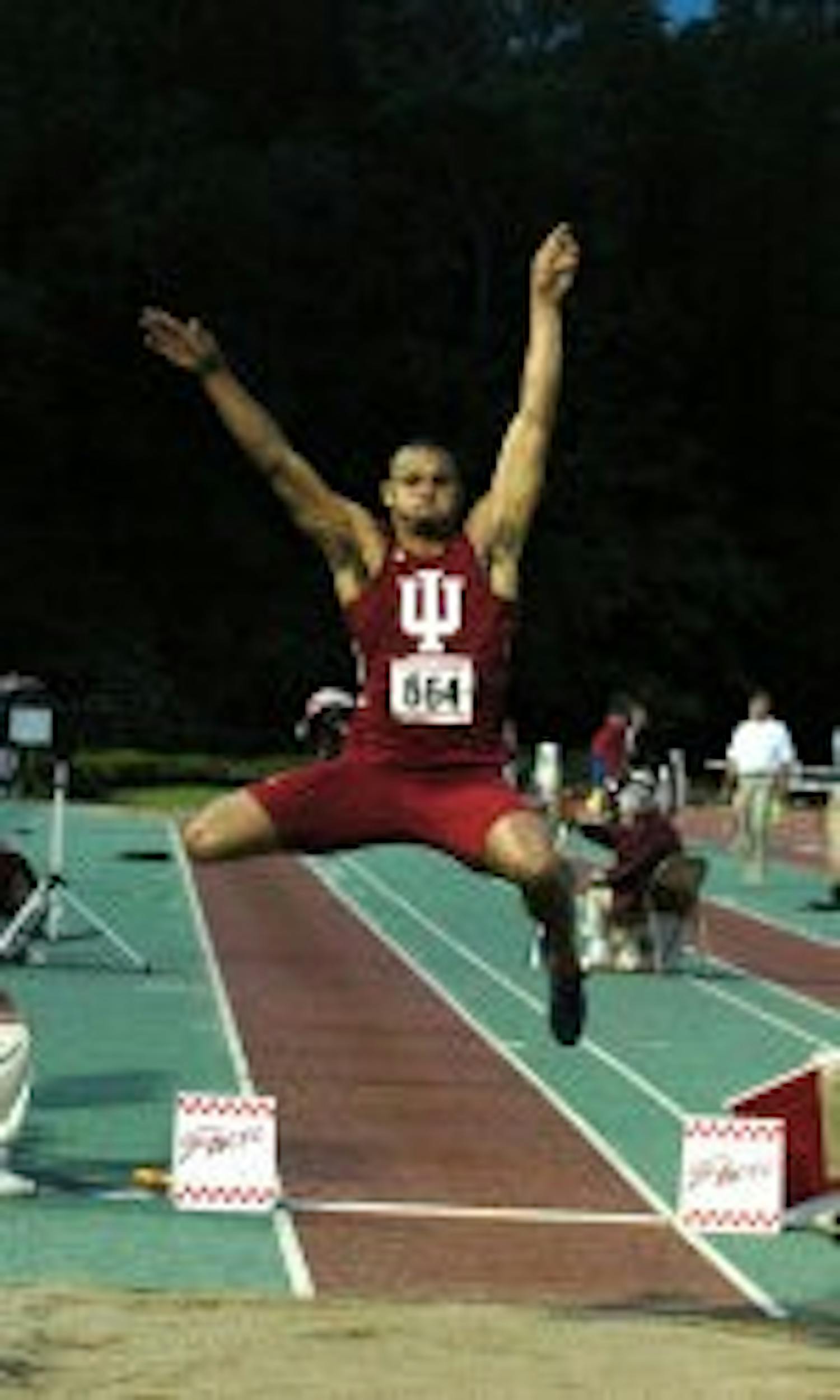 10-time Hooosier all-American Aarik Wilson finishes off a jump at the 2005 Outdoor Track and Field Championships in Sacramento, Calif., where he finished 3rd. While at IU, Wilson won an NCAA title in the Long Jump and Triple Jump during the 2005 NCAA Indoor Championships and will aim to earn a spot on the U.S. Track and Field Olympic Team this weekend.