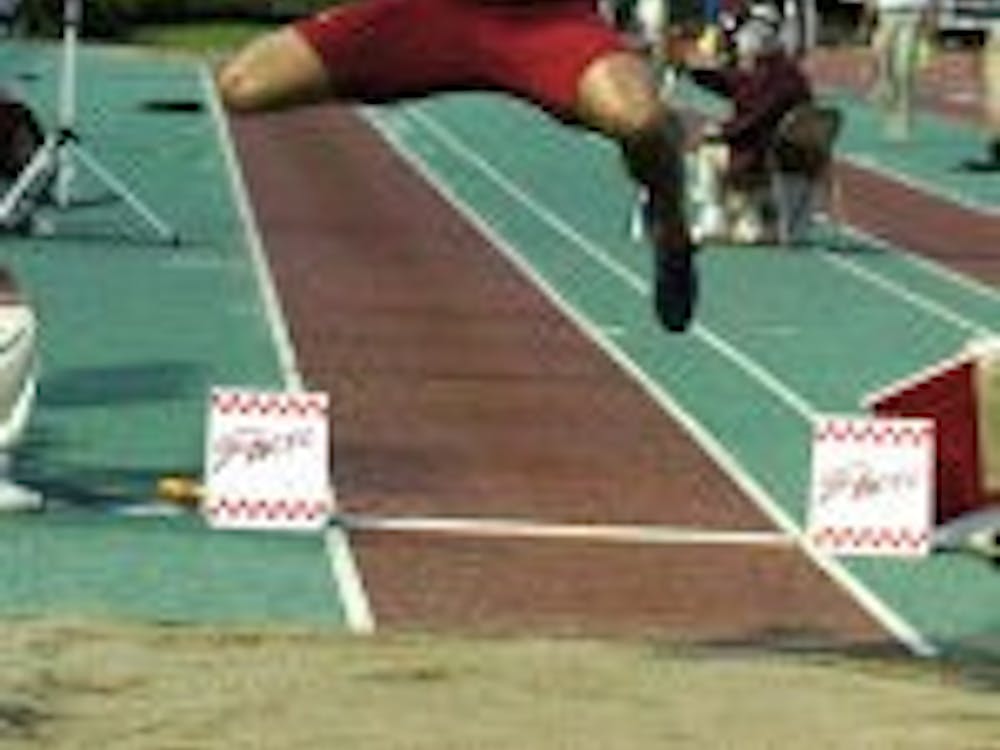 10-time Hooosier all-American Aarik Wilson finishes off a jump at the 2005 Outdoor Track and Field Championships in Sacramento, Calif., where he finished 3rd. While at IU, Wilson won an NCAA title in the Long Jump and Triple Jump during the 2005 NCAA Indoor Championships and will aim to earn a spot on the U.S. Track and Field Olympic Team this weekend.