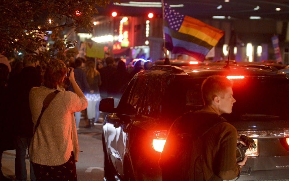 Thousands of protestors take to the streets of Indianapolis in a march against the presidential victory of Donald Trump during the Trump Resistance Rally Saturday evening at the Indiana State House in Indianapolis.
