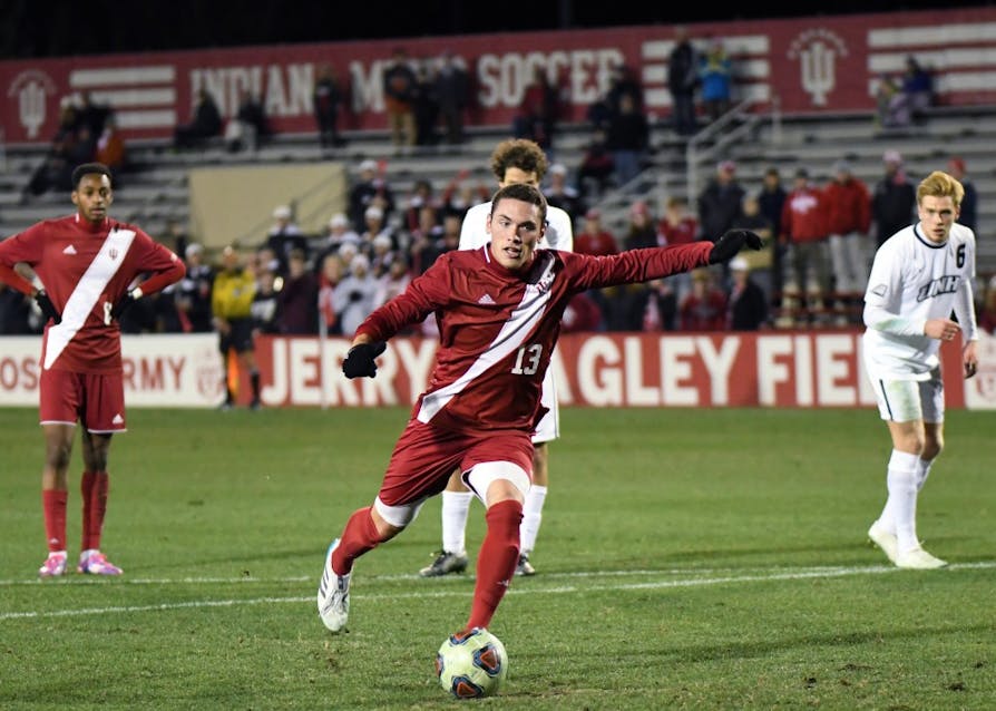 Junior midfielder Francesco Moore makes a penalty kick against New Hampshire in the third round of the NCAA tournament Saturday evening at Bill Armstrong Stadium. IU defeated New Hampshire, 2-1, to advance to the quarterfinals of the NCAA tournament against Michigan State.