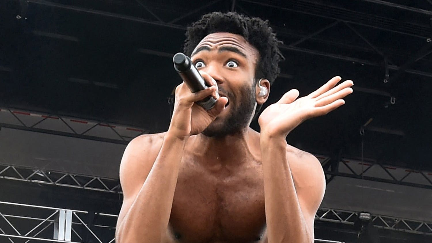 Childish Gambino performs on the main stage on the infield before the 140th running of the Preakness Stakes on May 16, 2015, at Pimiico Race Course in Baltimore, Maryland.