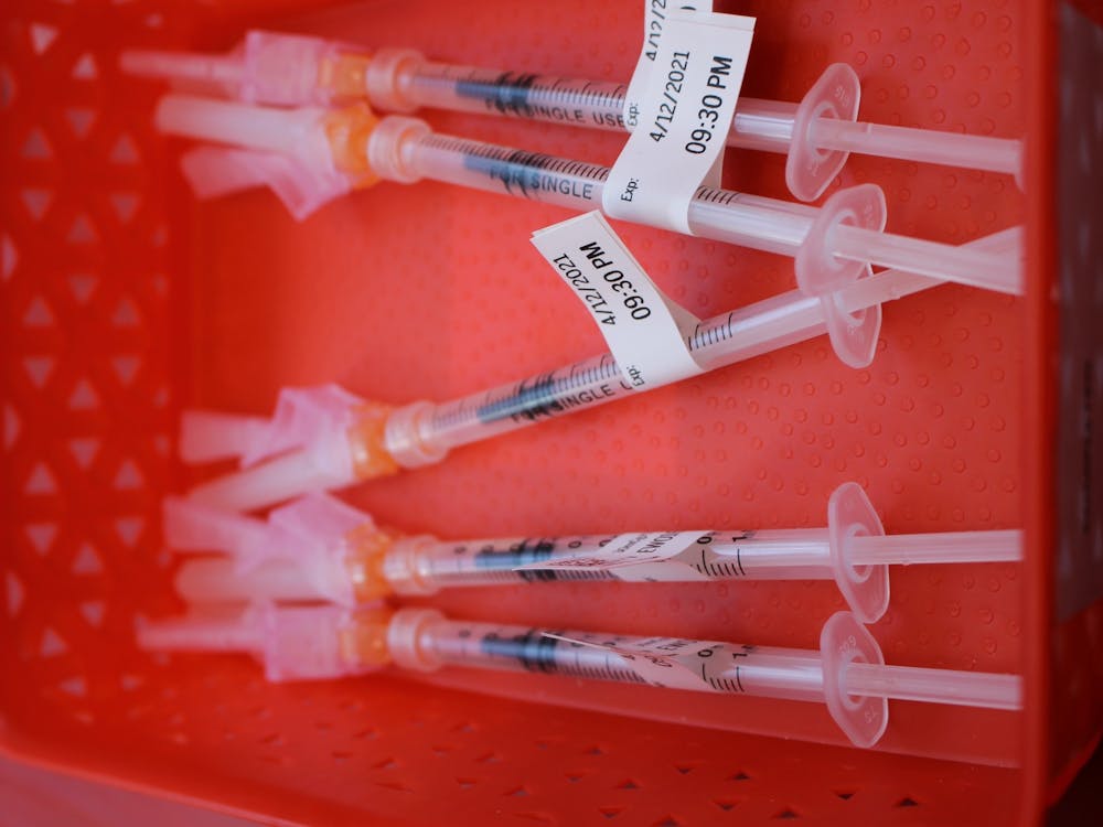 COVID-19 vaccinations appear in a tray on April. 12, 2021, at a Simon Skojdt Assembly Hall vaccine clinic. A new COVID-19 PCR testing site will open at 500 N. Profile Parkway on Tuesday, Monroe County health administrator Penny Caudill said Friday during a press conference.