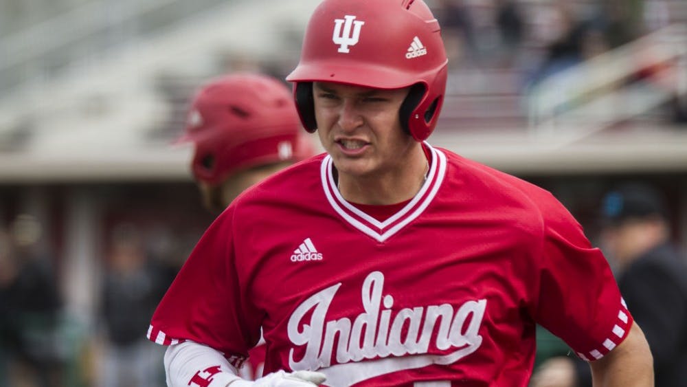 Sophomore Matt Gorski scores the second run for IU after a teammate hits a line drive out against Purdue during the 2018 season. Gorski hit a three-run home run Thursday, which extended IU's walk-off win against Michigan State into extra innings.