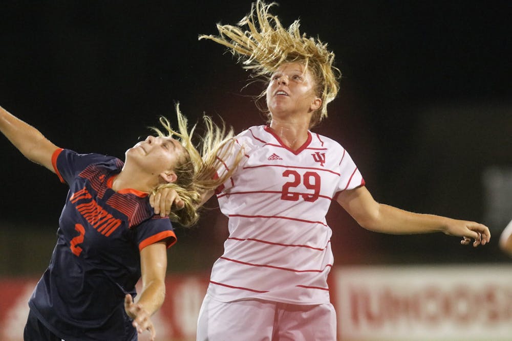 <p>Junior Alaina Kalin goes to head the ball Aug. 27, 2021, in Bill Armstrong Stadium. The IU women’s soccer team conceded its first goal of the season during the match.</p>