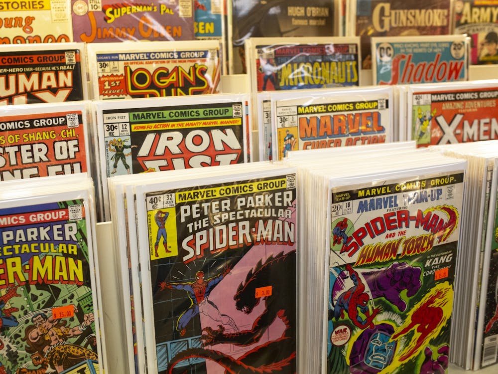Comic books are pictured March 4, 2022, at Vintage Phoenix Comics. Behind the desk are boxes of comic books set aside for their subscribers, more than 200 people.