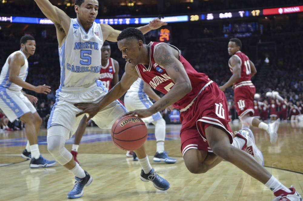 Junior guard Troy Williams drives through a North Carolina defender towards the net on Mar. 25 at the Wells Fargo Center. Indiana lost 101-86.