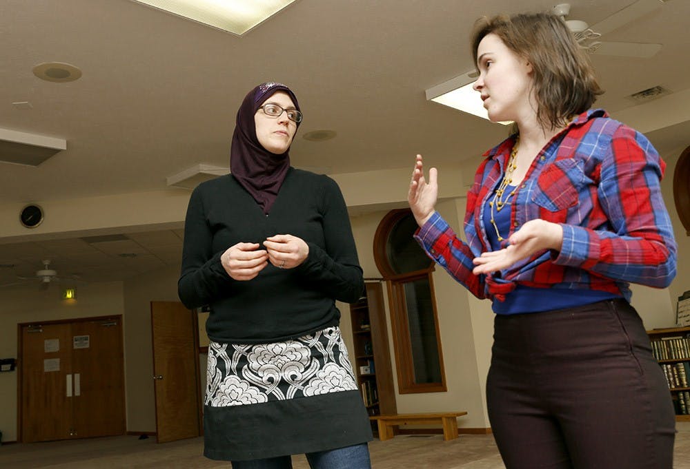 Anna Maidi, left, and Aubrey Seaders talk Monday at Islamic Center. They have recently produced a project Muslims of Bloomington, consists of two smaller projects, The Hijab Diaries and the Muslims of Bloomington Blog, to promote understanding of what Islam and Musliam Americans. 