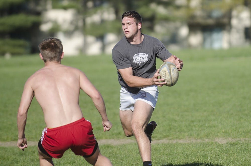 Bryce Campbell looks to pass the ball while practicing Tuesday. 