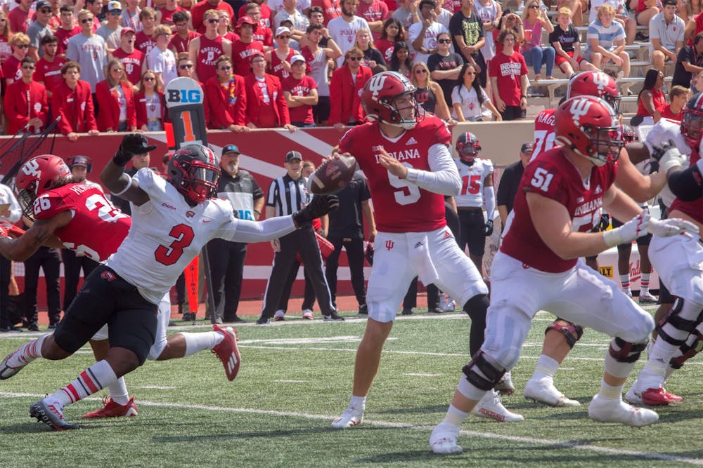 <p>Redshirt junior Connor Bazelak looks for an open reciever Sept. 17, 2022, at Memorial Stadium. Bazelak had a rushing touchdown but went 23/41 with just 210 passing yards in Indiana football&#x27;s 24-17 loss to Rutgers in Piscataway, New Jersey Saturday.</p>
