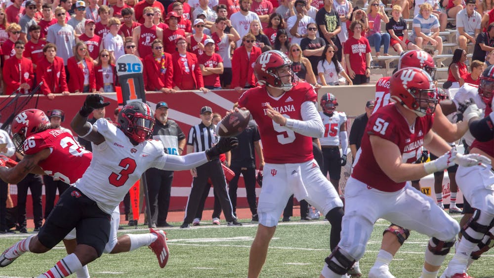 Redshirt junior Connor Bazelak looks for an open reciever Sept. 17, 2022, at Memorial Stadium. Bazelak had a rushing touchdown but went 23/41 with just 210 passing yards in Indiana football&#x27;s 24-17 loss to Rutgers in Piscataway, New Jersey Saturday.