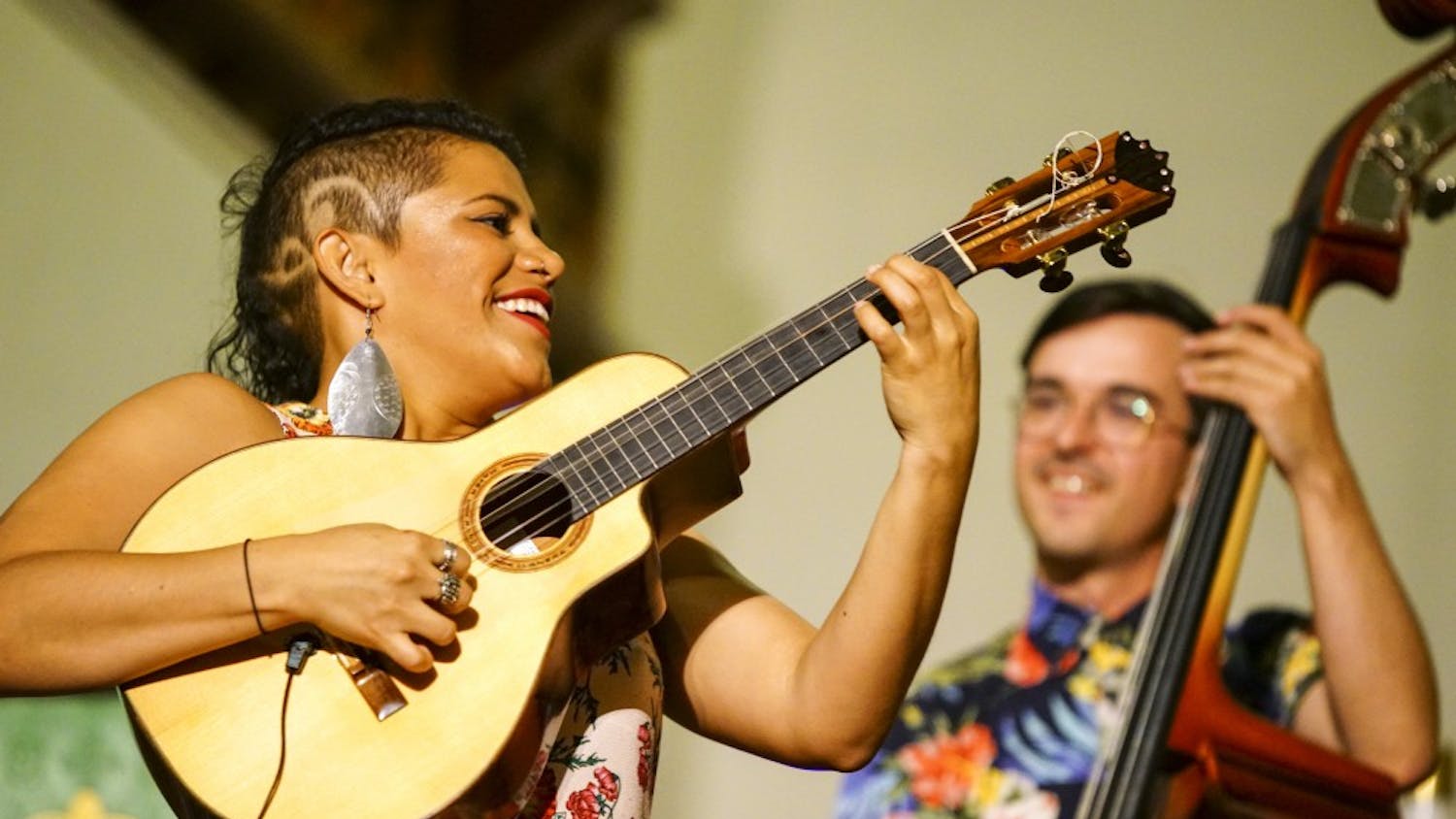 Mafer Bandola of Ladama plays a solo on the bandola llanera during the Lotus World Music and Arts Festival Saturday night in the First United Methodist Church. Ladama specializes in Pan-American music combining the styles of traditional Brazilian, Venezuelan and Colombian music with contemporary American pop and jazz.