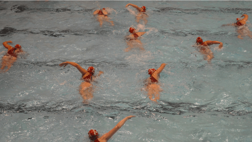 The IU women’s water polo team swims lanes March 7, 2020, in the Counsilman-Billingsley Aquatics Center. Indiana dropped to 0-2 against No. 7 Michigan this year after losing 11-10 on Saturday in Ann Arbor, Michigan.