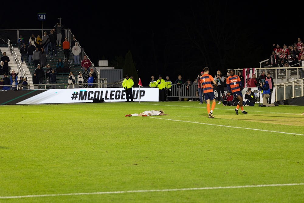 <p>Sophomore Forward Samuel Sarver falls to the ground after a failed shot attempt against Syracuse on Dec. 12, 2022 at WakeMed Soccer Park in Cary, North Carolina. Syracuse beat the Hoosiers in penalty kicks in the College Cup final.</p>