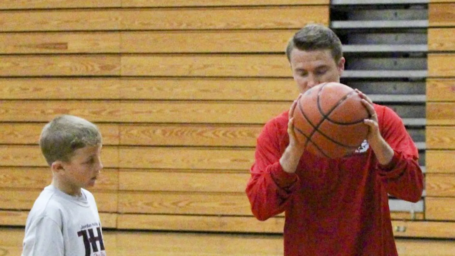 Jordan Hulls teaches students basketball skills Wednesday afternoon for his basketball camp at Bloomington South High School. “I want to teach theses kids the value of hard work,” Hulls said.