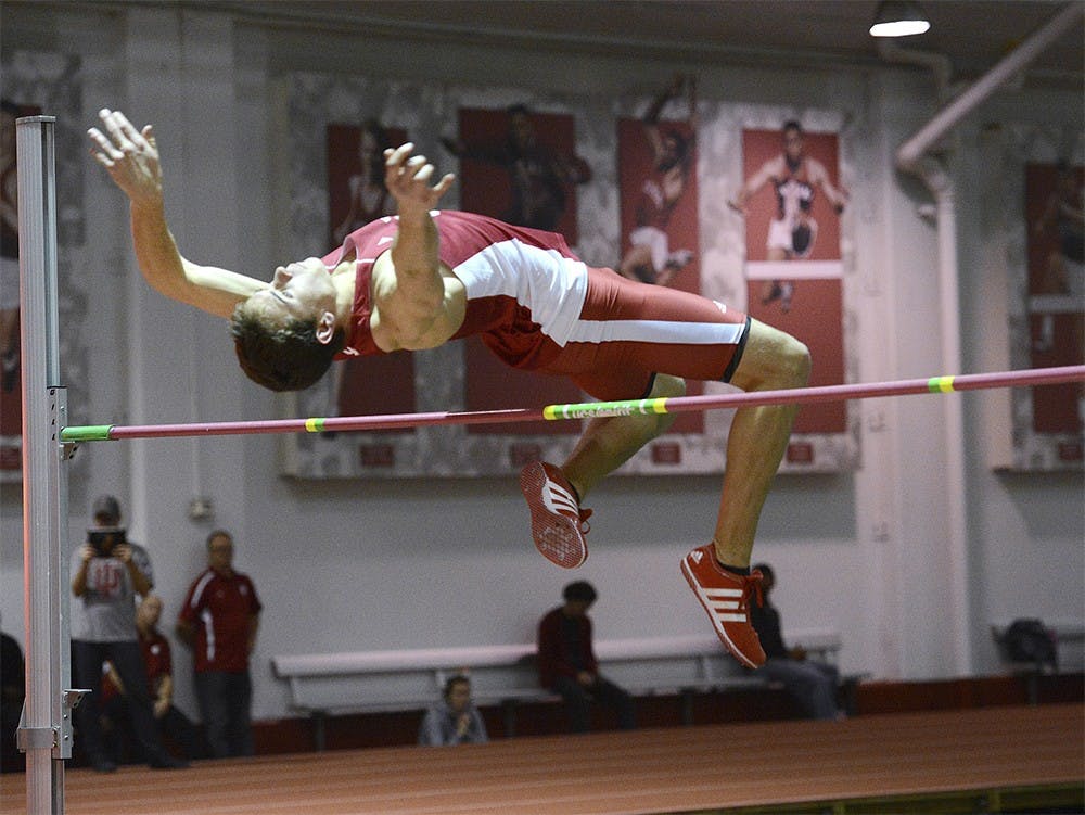 Stephen Keller competes in the High Jump at Hoosier Hills Invitational at Gladstein Fieldhouse on Feb, 14, 2014. 