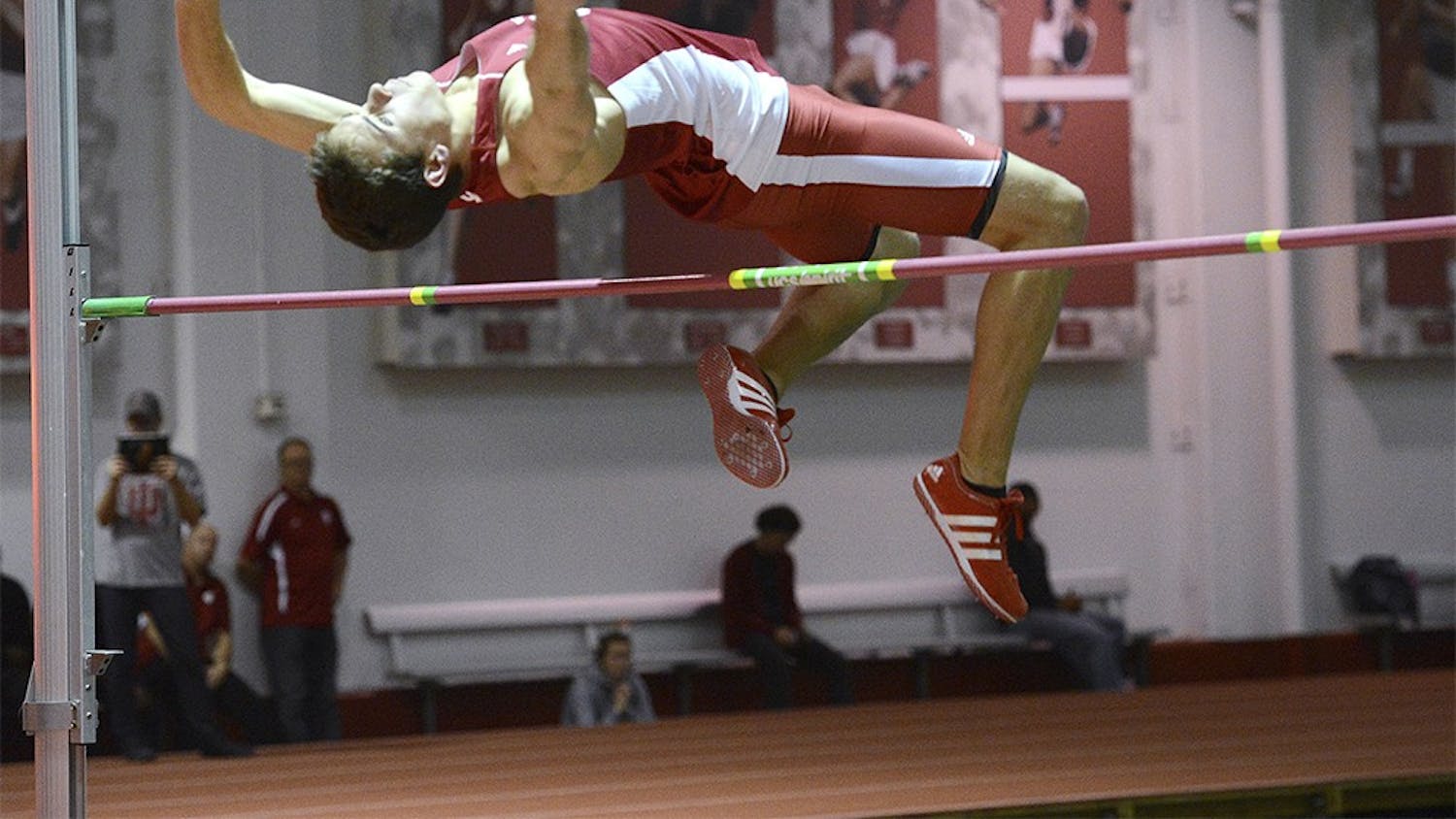 Stephen Keller competes in the High Jump at Hoosier Hills Invitational at Gladstein Fieldhouse on Feb, 14, 2014. 