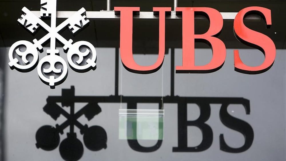 FILE - In this Feb. 12, 2009 file photo, the logo of the Swiss bank UBS, is seen in Aarau, Switzerland. The U.S. government and Swiss banking giant UBS AG have reached a long-awaited agreement in a case over secret Swiss bank accounts for alleged American tax evaders, lawyers for both sides told a federal judge Wednesday, Aug. 12, 2009.