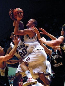 Junior forward Lance Stemler struggles for control of the ball during IU's 77-69 victory against Western Michigan on Dec. 20. The Hoosiers earned a 4-1 record during winter break.