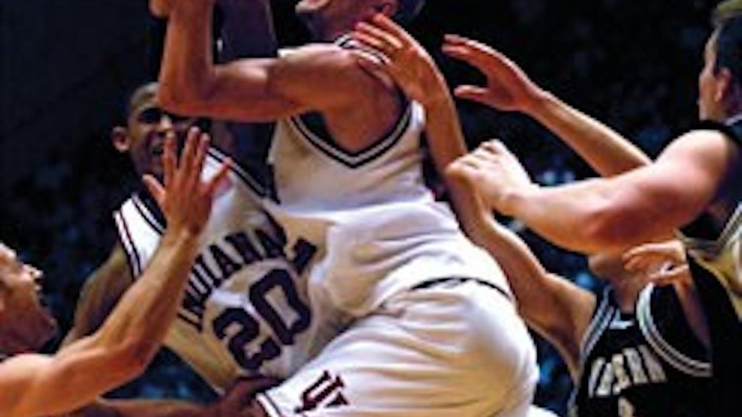 Junior forward Lance Stemler struggles for control of the ball during IU's 77-69 victory against Western Michigan on Dec. 20. The Hoosiers earned a 4-1 record during winter break.
