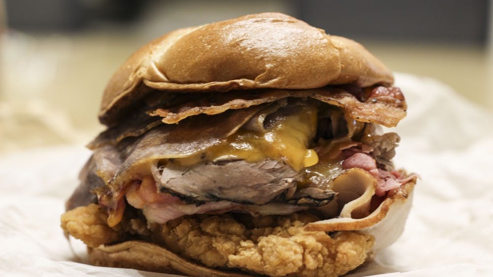 The Meat Mountain from Arby's includes two chicken tenders, roast turkey, ham, corned beef, smoked brisket, angus steak, roast beef, pepper bacon, cheddar and Swiss cheese.