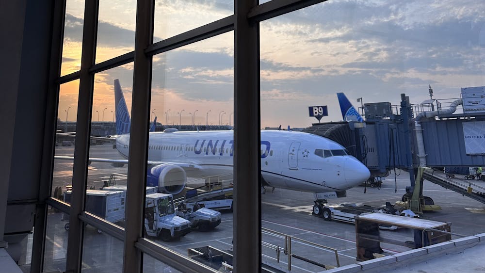 A plane stands outside the international departures terminal at O&#x27;Hare International Airport. Thirty European countries will now require additional authorization for visa-exempt travelers.