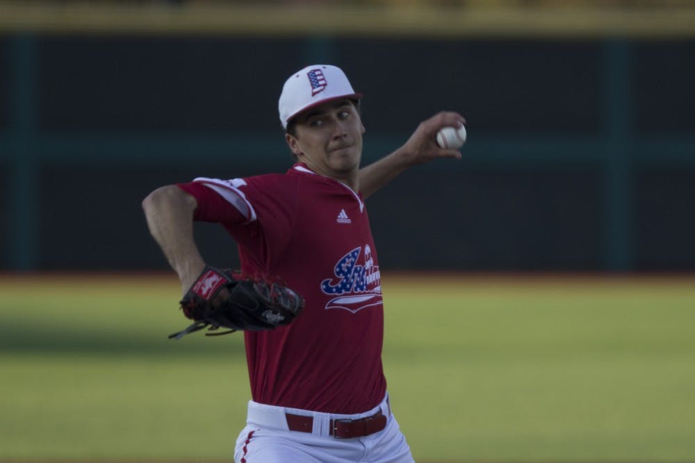 Senior left-handed pitcher Kyle Hart pitches to an Iowa hitter in the sixth inning of the game on Friday night at Bart Kaufman field. The Hoosiers won 7-1.