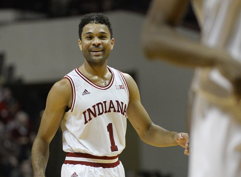 James Blackmon Jr. smiles with teammates after a timeout during IU's game against Savannah State on Saturday at Assembly Hall.