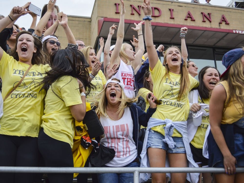 The sisters of Kappa Alpha Theta scream as their cycling team wins the Women's Little 500 on April 24, 2015, at Bill Armstrong Stadium. Theta is organizing a grilled cheese night to support Monroe County Court Appointed Special Advocates on Sept. 20.