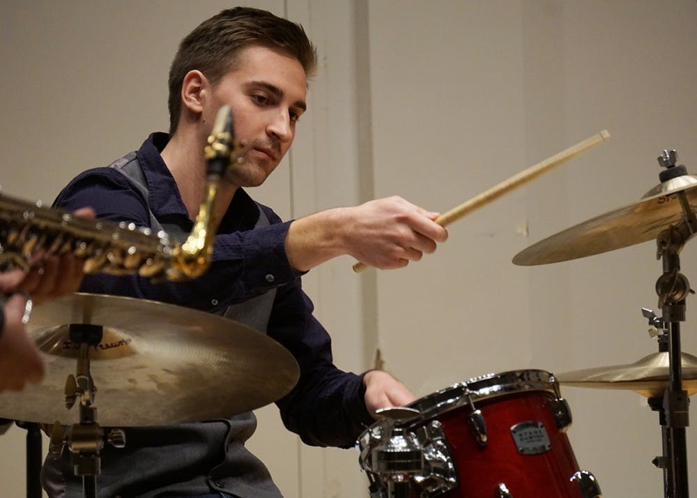 <p>Sophomore drummer Jarred Rusin strikes up a solo jazz beat from Soweto Kinch's "Never Ending" on Tuesday evening at Ford-Crawford Hall. The All-Campus Jazz Ensembles and Combos is directed by Ana Nelson and Barclay Moffitt.</p>
