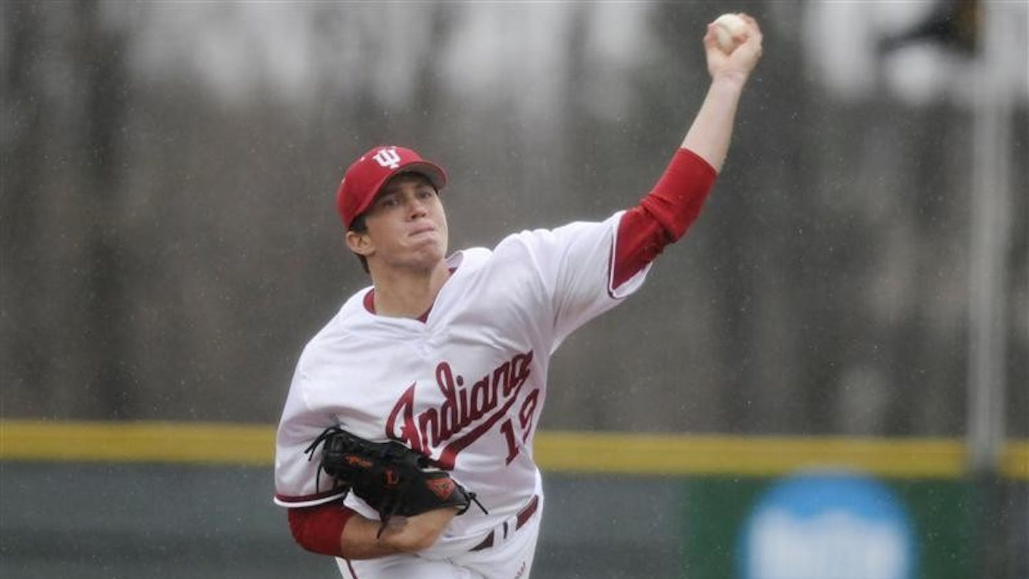 IU's Matt Bashore throws to a Chicago State batter during a game in the rain March 31 at Sembower Field.