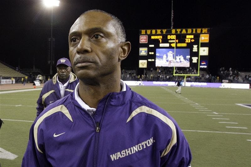 Washington football coach Tyrone Willingham leaves the field after his team lost to Notre Dame on Saturday in Seattle. Notre Dame won 33-7.